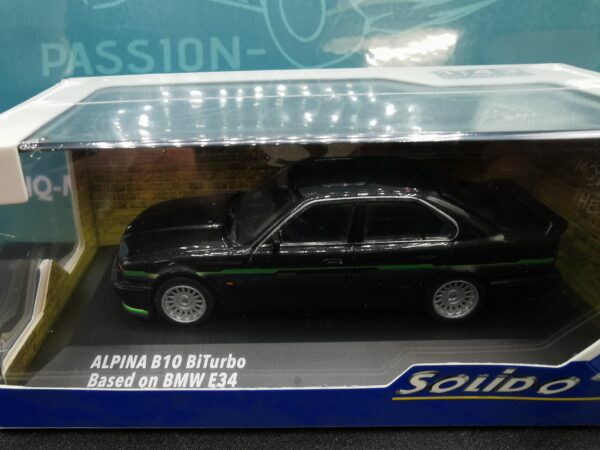 ALPINA B10 BITURBO BASE E34 DIAMOND BLACK WITH GREEN AND BLUE STRIPES SOLIDO 1/43 EME