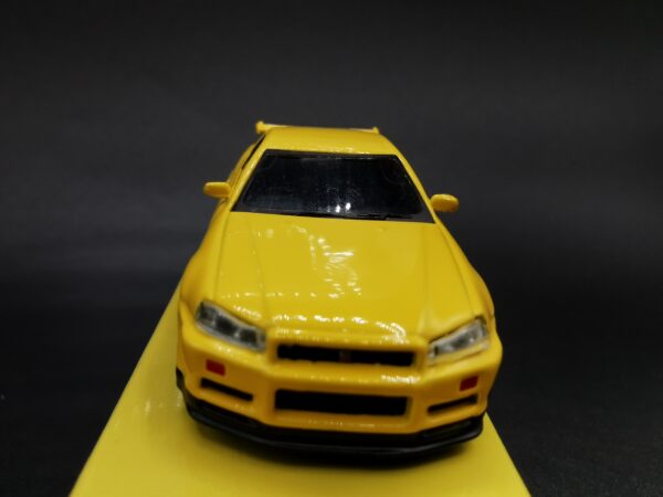 NISSAN SKYLINE GT-R R34 V-SPEC LIGHTING YELLOW MINI GT 1/64 EME – Image 4