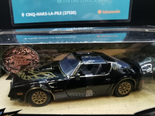 PONTIAC TRANS AM FIREBIRD 1977 BLACK JADA 1/24 EME